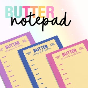 May include: A white ceramic mug with a black handle and the text "But First, Coffee" in a black, handwritten-style font. The mug is on a white surface.