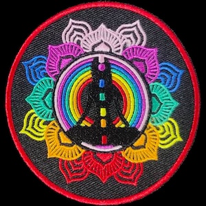 May include: Embroidered patch with a rainbow peace sign inside a colorful mandala. The peace sign is black with a white outline and a yellow, orange, red, purple, blue, and green vertical line down the center. The mandala is made up of seven flower-like shapes in shades of blue, green, yellow, orange, red, purple, and pink.