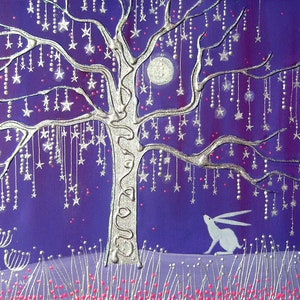 May include: A silver tree with a white moon and stars hanging from its branches. The tree is on a purple background with pink flowers at the bottom. A white rabbit is standing in the grass below the tree.