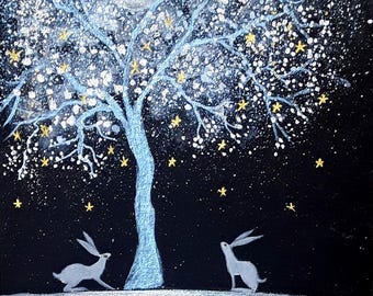 May include: An acrylic painting depicts a nighttime scene with a large, silver moon and a tree with blue branches and white blossoms. Two white hares stand on a snowy ground, with yellow stars scattered across the black sky.