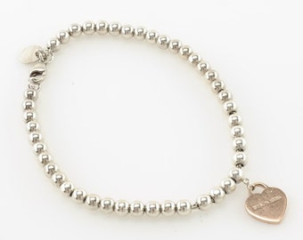 TIffany & Co Sterling Silver Beaded Bracelet Heart Charm Rubedo