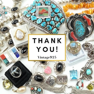 a variety of jewelry and accessories, including necklaces, bracelets, and earrings, arranged on a white background. In the center of the image, there is a sign that says "THANK YOU!"