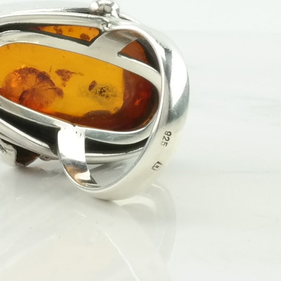 Large Oval Amber Honey Ring in an Oxidized Sterling Silver Setting Large Oval Amber Honey Ring in an Oxidized Sterling Silver Setting