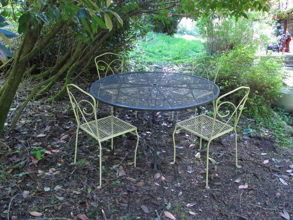 wrought iron dining room table and chairs