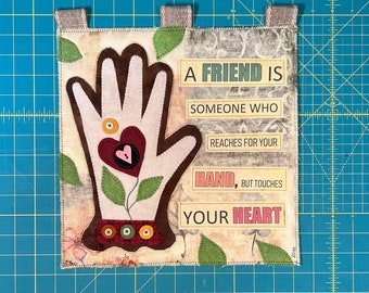 A Friend Is - Heart in Hand - Wool and Mixed Media Wall Hanging