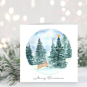 Handgemachte Weihnachtskarte mit Hase // Aquarell Weihnachtskarte, verschneiter Wald, Kaninchen im Schnee