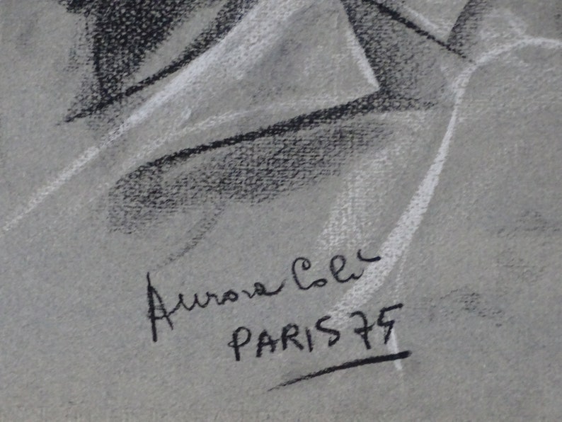 May include: Black and white drawing with a signature that reads "Aurora Colec PARIS 75".