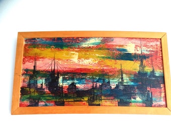 May include: Abstract painting of a cityscape at sunset with a colorful sky in shades of pink, yellow, blue, and green. The city is depicted in black silhouettes against the colorful sky.
