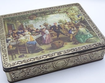 Large storage tin, lid decorated with an image of Jan Steen's painting 'Dancing Couple'