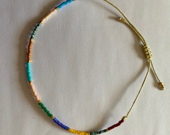 Multi coloured macrame beaded bracelet. Perfect for stacking.