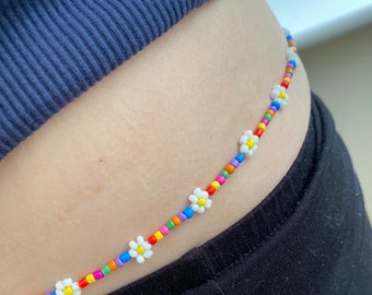 African style waist beads. Chose your length. Pretty white daisy with multicoloured rainbow beads