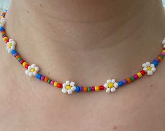 Dainty choker daisy and multi coloured rainbow beaded necklace in three sizes.