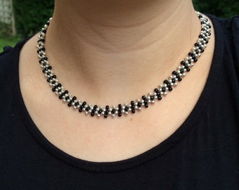 Black and silver beaded necklace with silver plated lobster clasp 16 inches