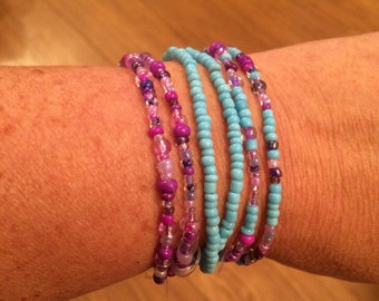 Set of three stretchy bracelets turquoise and purple