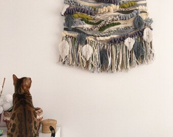 Eva's Doodlings wall hanging tapestry with leaves green gray shades