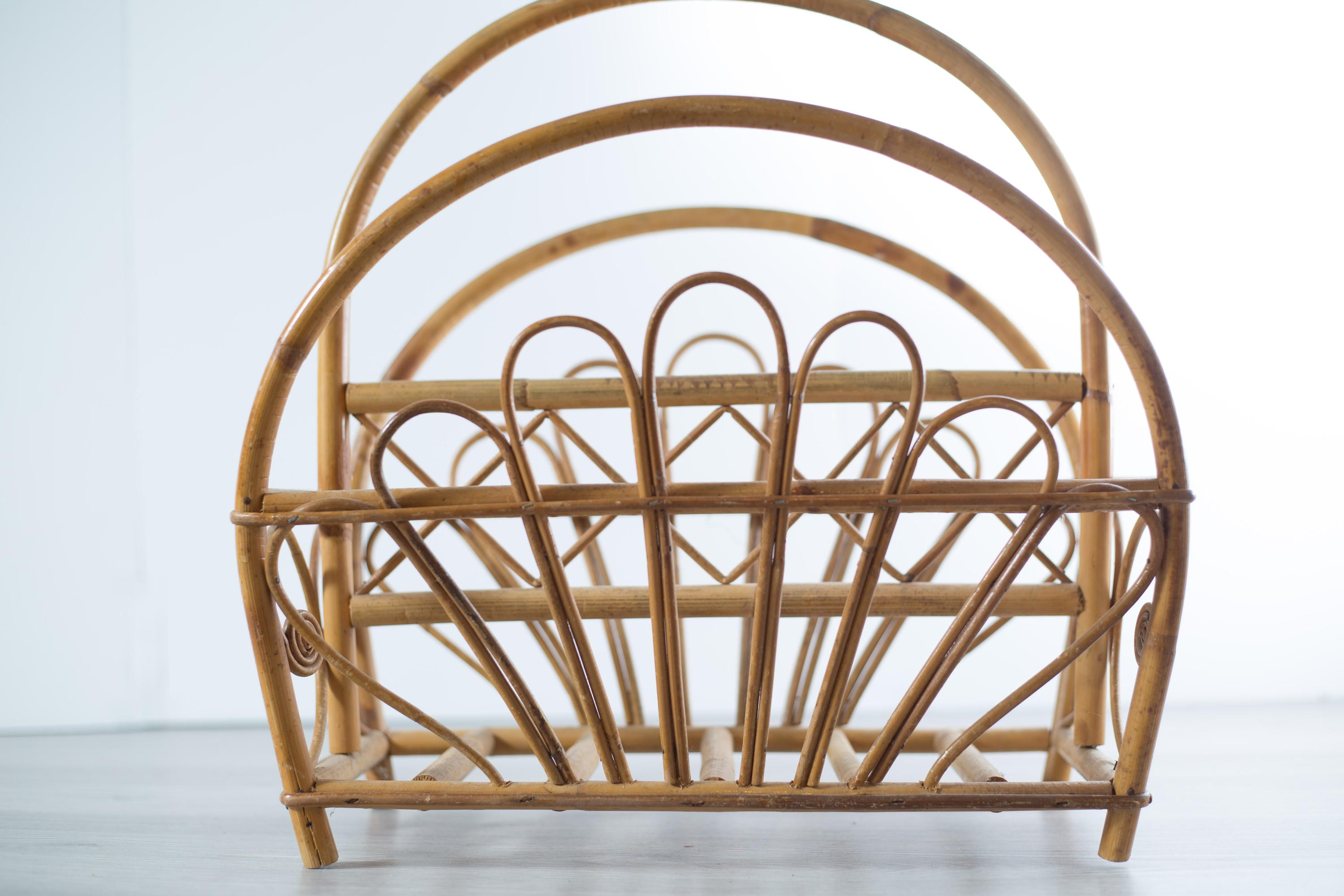 Vintage Rattan Wicker Magazine Rack with Ornate Pattern and Carrying