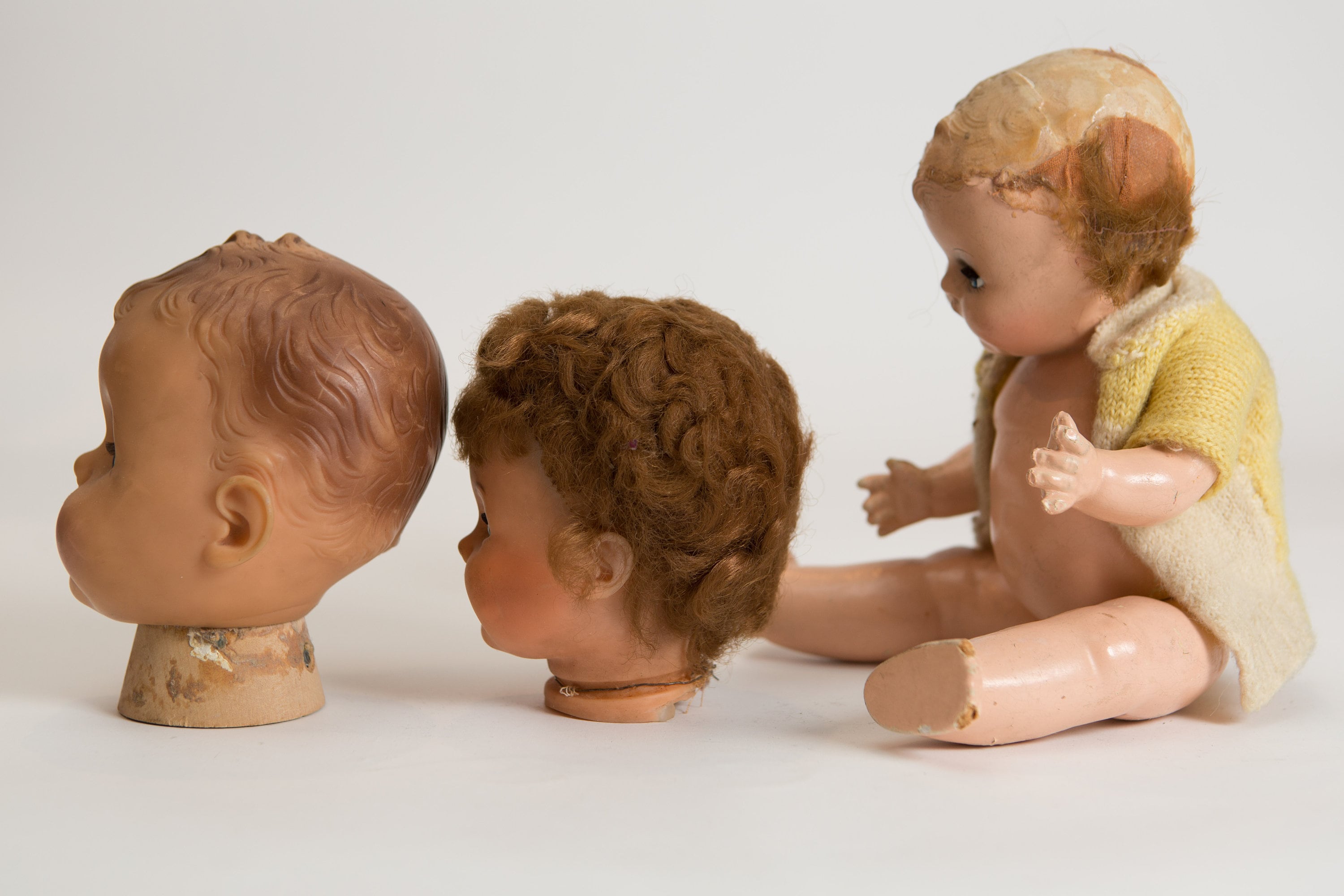 Vintage Doll Heads and Plaster Doll and Sleeping Eyes and Moving Arms