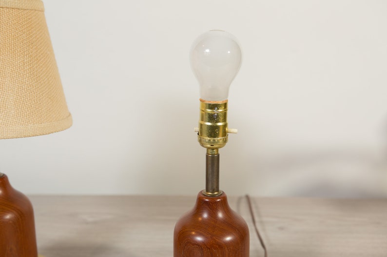 Pair of Vintage Mid Century Modern Danish Scandinavian Wood Lamp with Original Shades in a cream colour Teak Desk Lamps