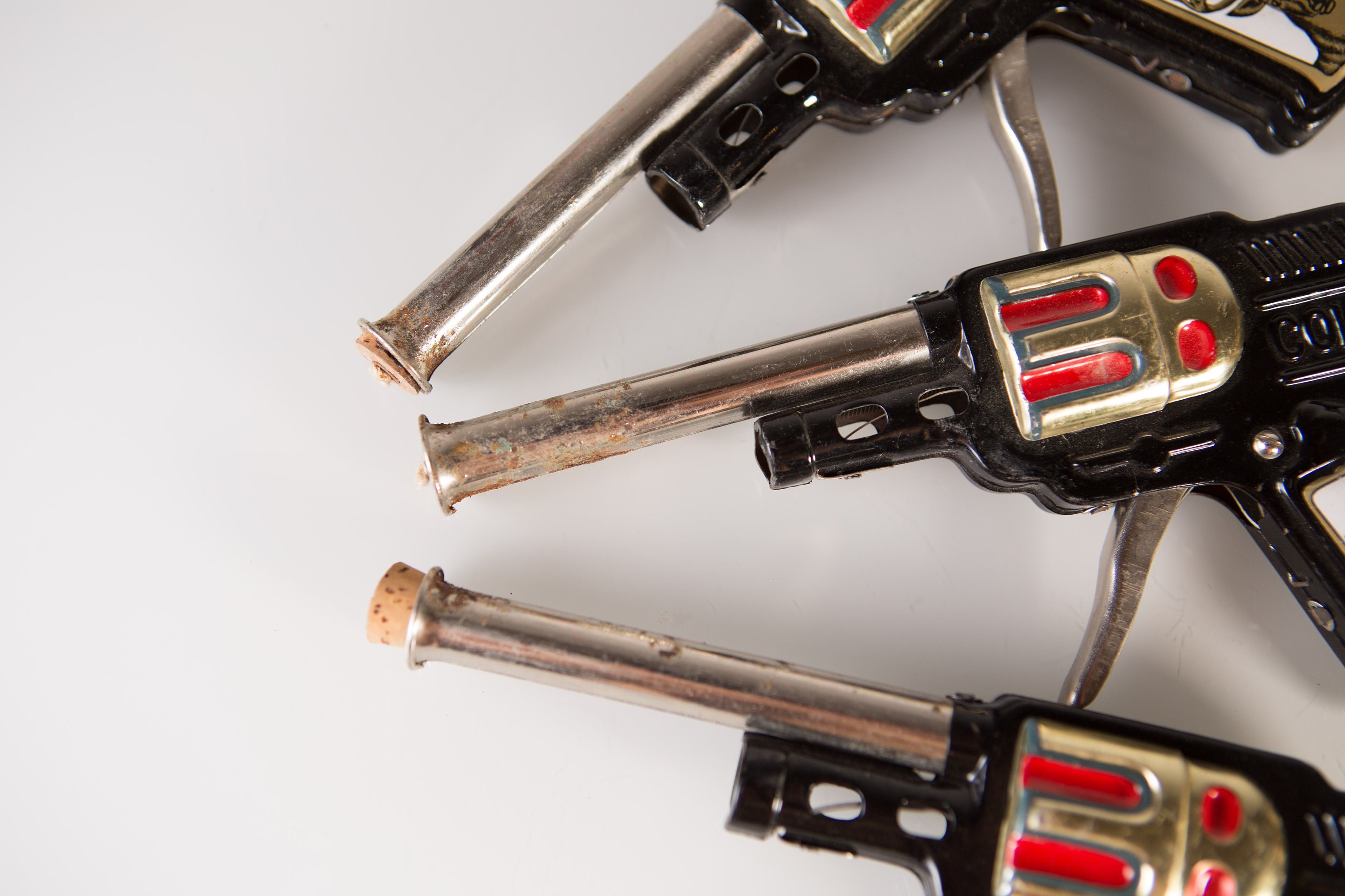 3 Vintage Toy Guns Colt 5 Pop Sparking Gun with Cork Stopper Made in Japan Tin Metal