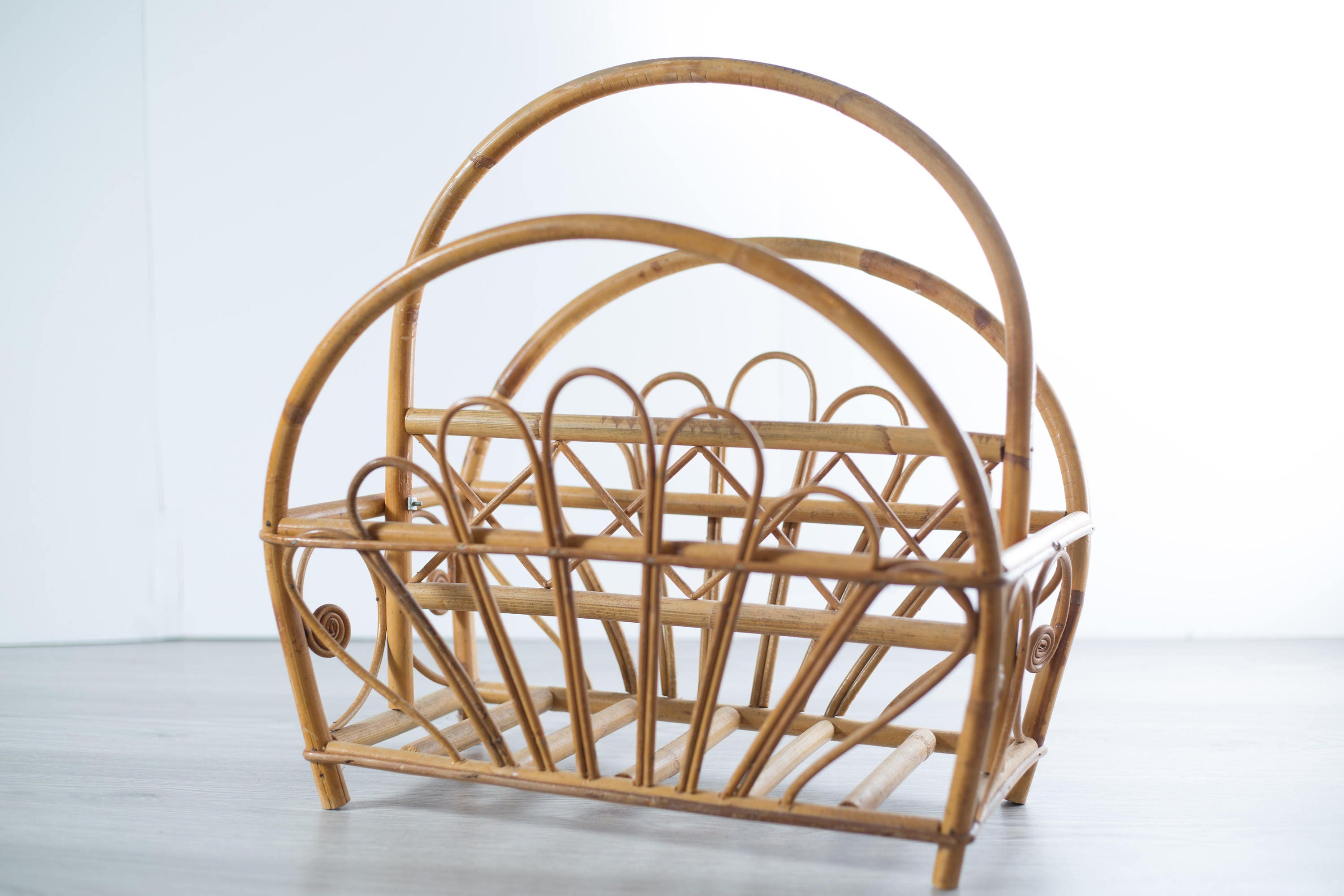 Vintage Rattan Wicker Magazine Rack with Ornate Pattern and Carrying