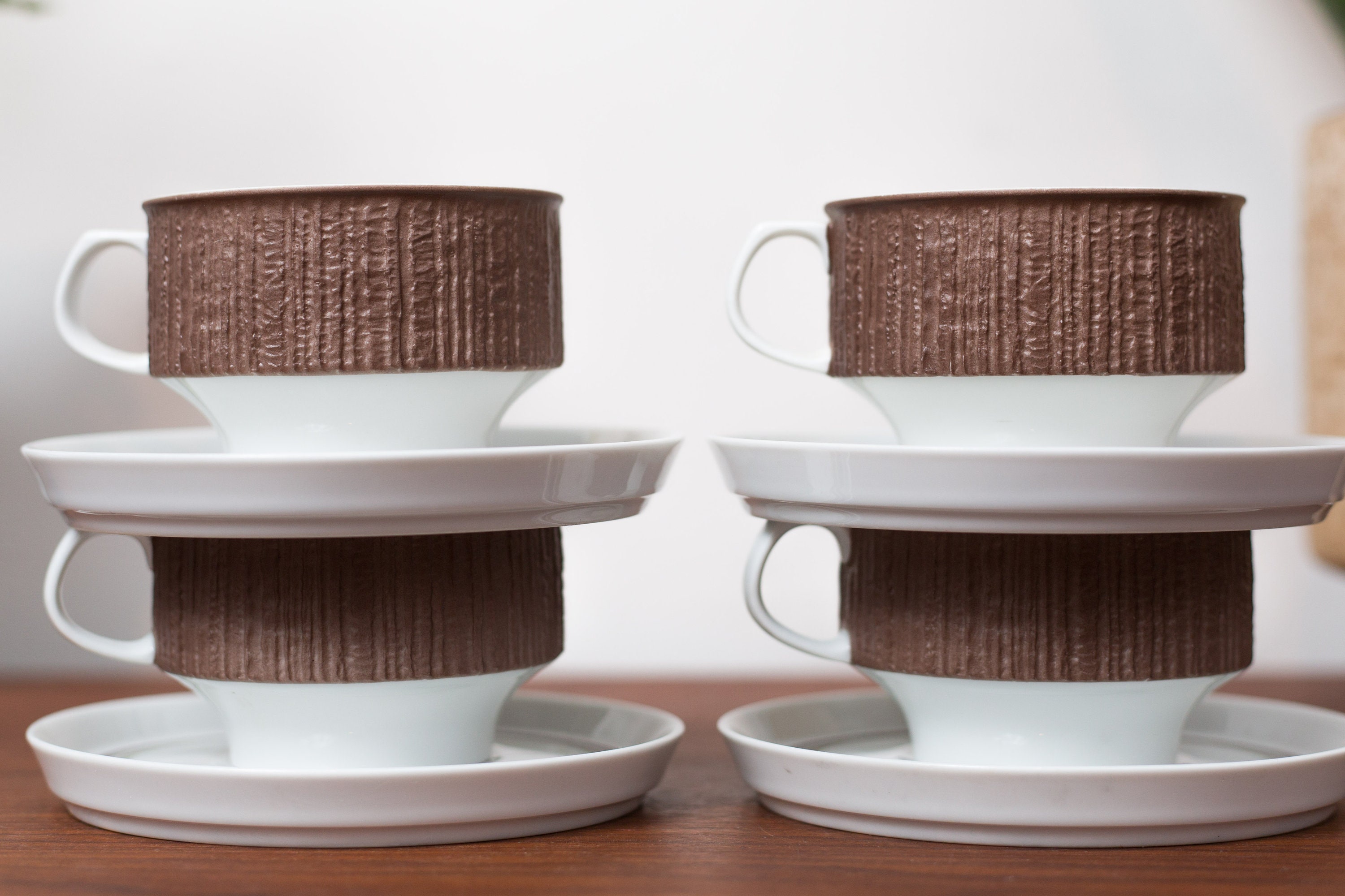 tea cup with wooden saucer