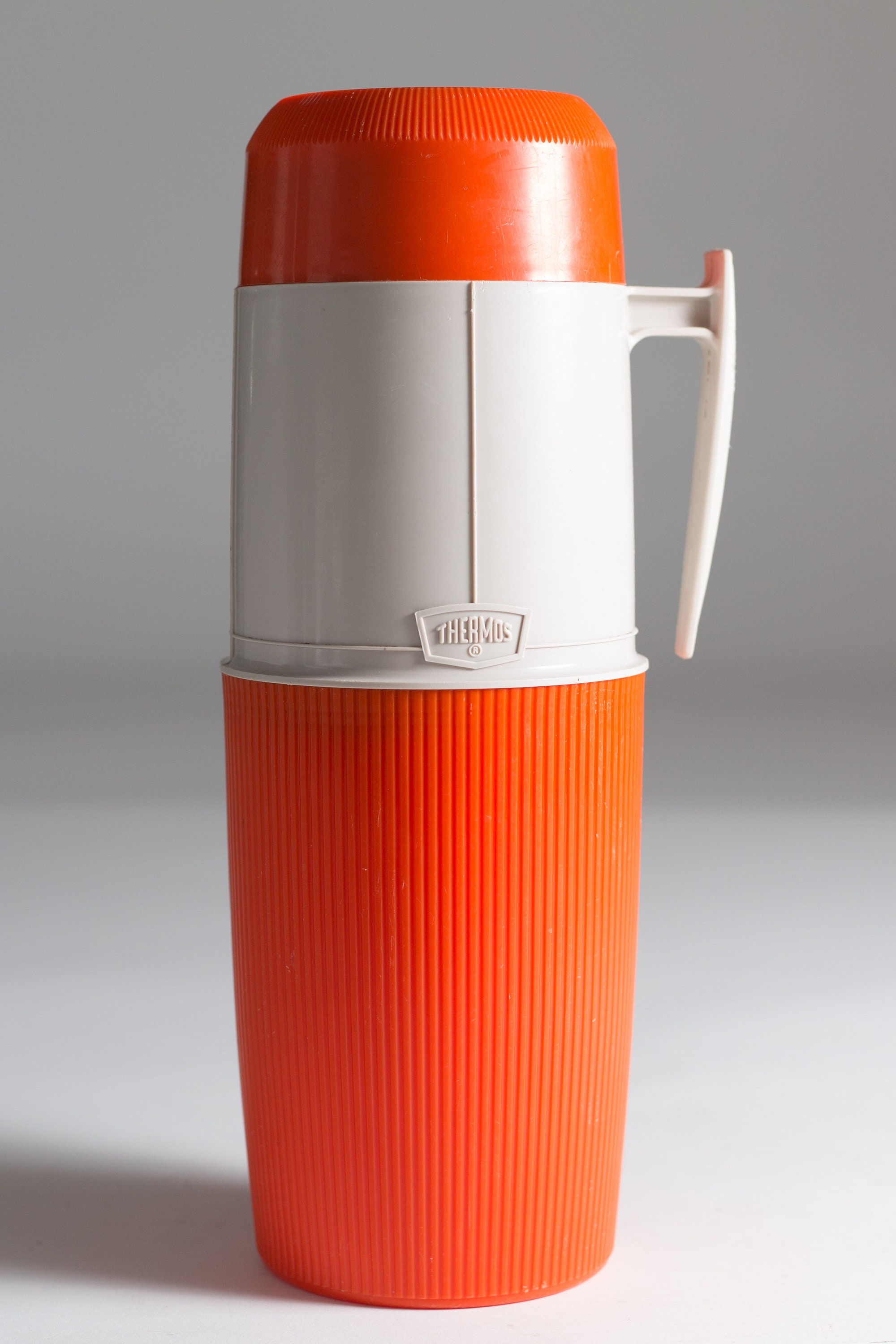 vintage thermos vacuum bottle Orange Colored Dipped Glass Lined