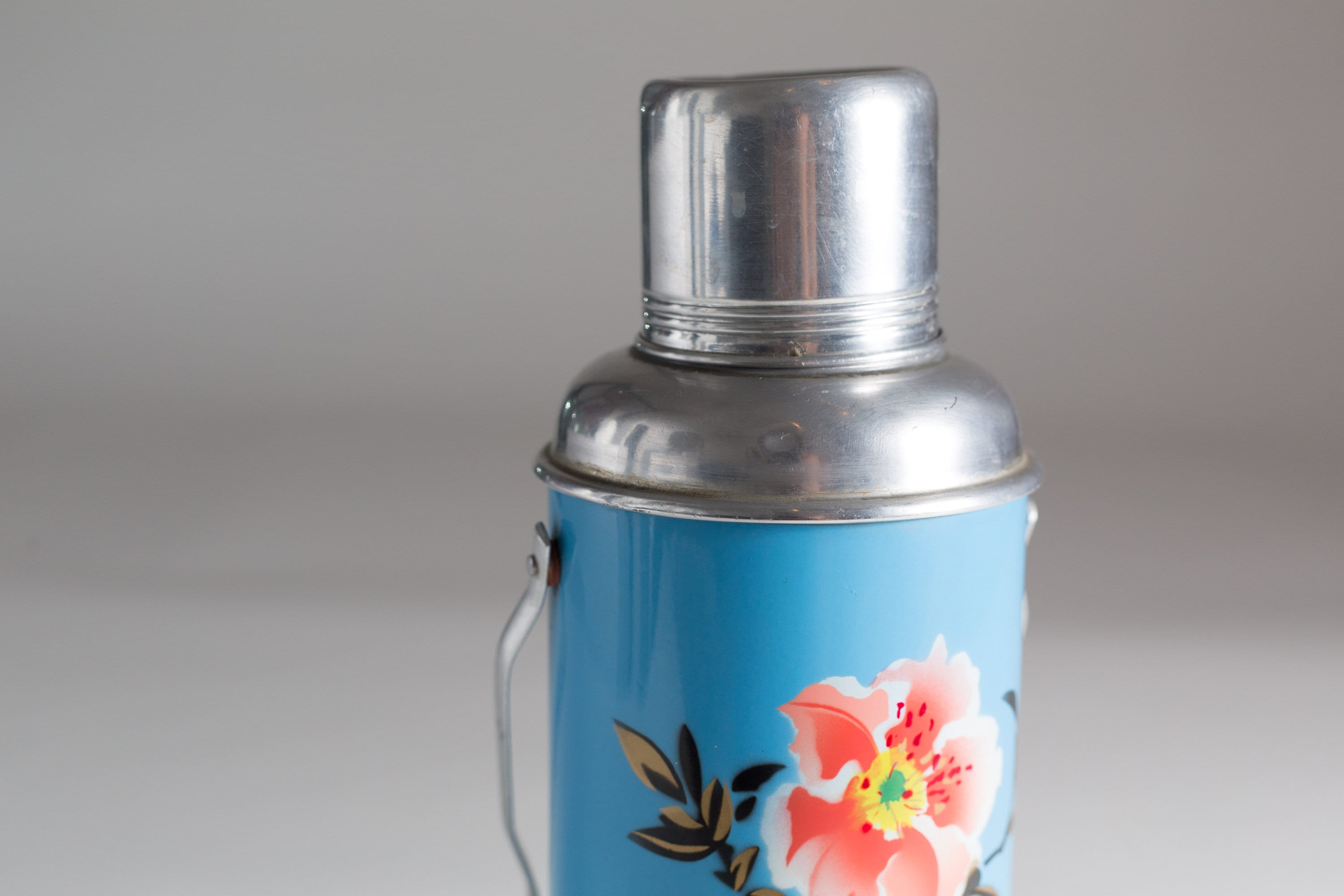 vintage thermos vacuum bottle Blue Colored Floral Metal and Glass