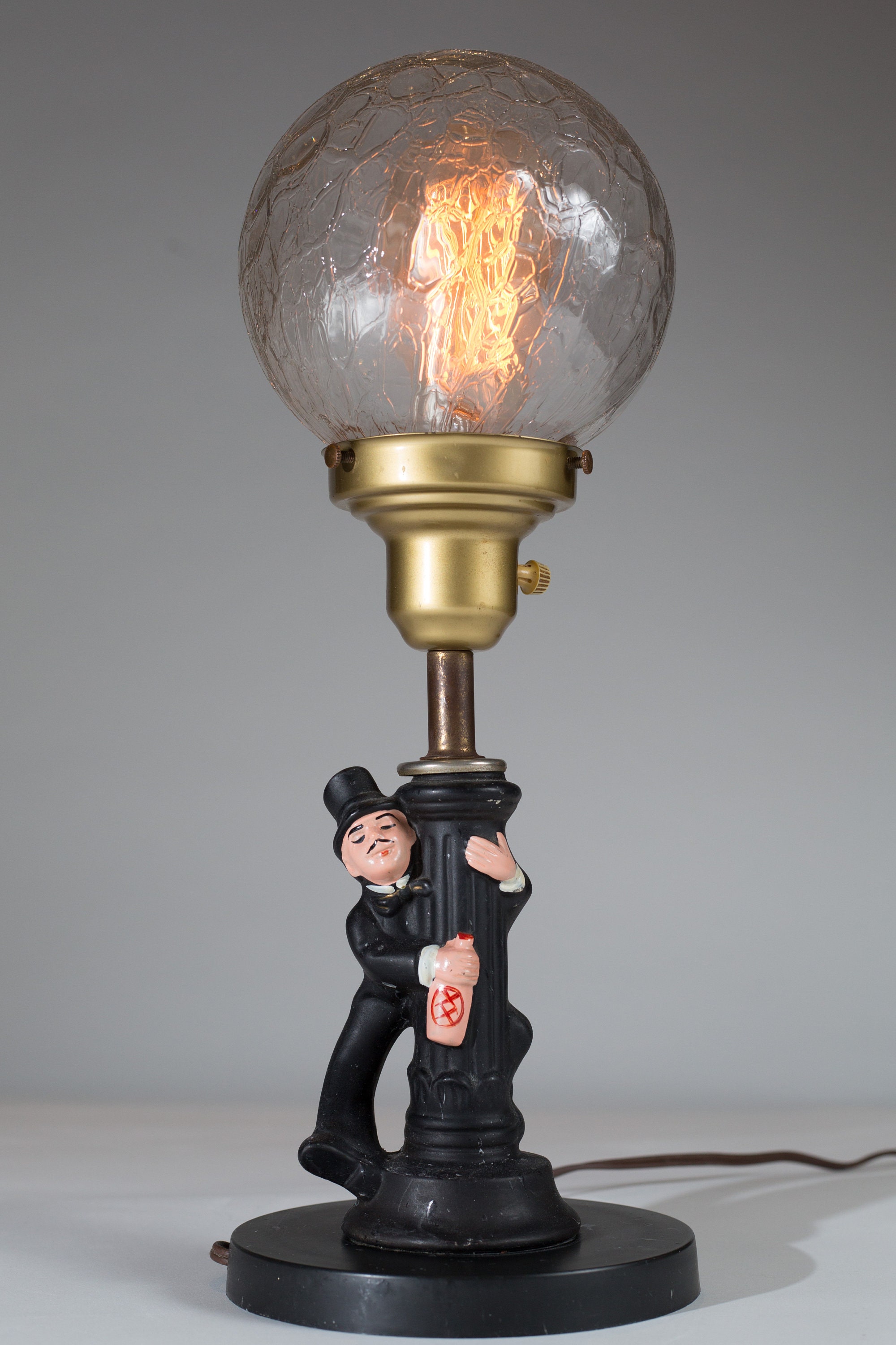 Figural Bedside Lamp Drunk Man in Suit and Top Hat Gripping Pole