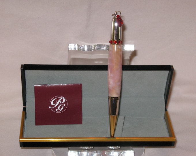 Diva Charm Red Crystal Twist Style Pen in a Rhodium and Gold T/N(Pink Aqua Pearl Acrylic Blank)(includes a felt lined pen box)