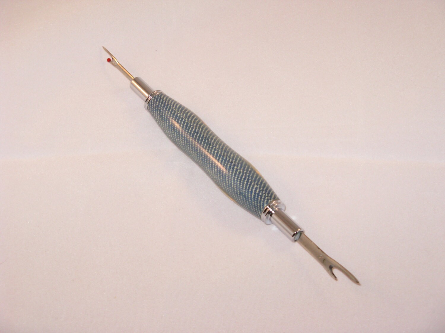 Handmade Seam Ripper with a ( a Laminated Blue Denim blank in a Chrome