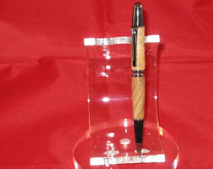 Patrizio Europeo Twist Pen  (Stabalized Siberian Elm Burl) includes a felt lined Pen case