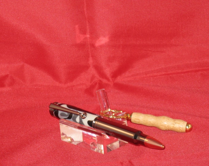 Magnum Bullet Cartridge Twist Pen(Gun Metal Finish) includes a  small wood keychain as a Gift along with pen box