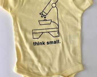 Think Small baby one-piece, size 6-12 months, screen printed, silk screened, black print on soft yellow romper