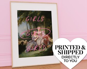 May include: A framed print of a vintage painting of two women in a garden setting. The painting is overlaid with the word "GIRLS" in pink lettering.