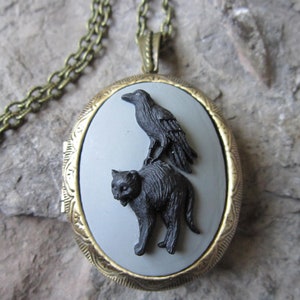 Choose on Gray, Cream or White - Raven, Crow, Black Bird on a Black Cat Cameo Bronze Lockets - Halloween, Witch, Witch Accessory Goth