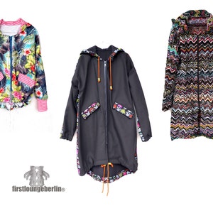 May include: Three hooded jackets with different patterns. The first jacket has a floral print with pink accents. The second jacket is black with a skull print on the bottom. The third jacket has a colorful chevron pattern.