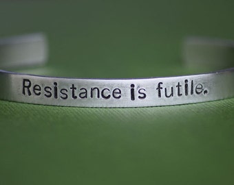 Resistance is Futile. - Hand Stamped Aluminum Bracelet Cuff