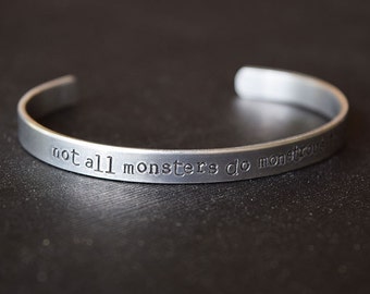 Not all monsters do monstrous things - Hand Stamped Aluminum Bracelet Cuff