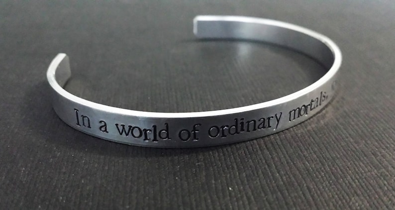 In a world of ordinary mortals, you are a Wonder Woman Hand Stamped Aluminum Bracelet Cuff image 1