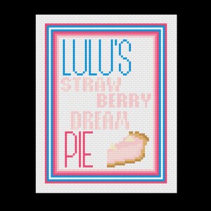May include: A cross-stitch pattern with a pink and blue border. The text reads "Lulu's Strawberry Dream Pie" with a pink and white pie slice in the corner.