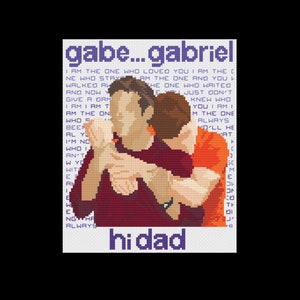 May include: A cross-stitch embroidery design featuring two men hugging. The design includes the text "gabe...gabriel" and "hi dad".