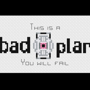 May include: Cross-stitch design on white fabric with the words "This is a bad plan, You will fail." The words are in black block letters. A gray and pink geometric shape is between "bad" and "plan".