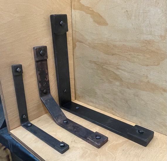 Forged iron /steel corbels for your countertop or shelving needs. Pride in craftsmanship and attention to fit and finish is my specialty!