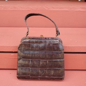 Vintage Alligator handbag 1950&#39;s era Leather interior gold hardware Top strap handle rare find