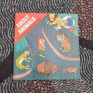 Richard Scarry soft cover book from the 70&#39;s About Animals Golden Look Book used condition  11 pages classic Richard  Scarry kid&#39;s book