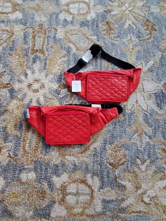 Set of two fanny packs new with tags genuine leath