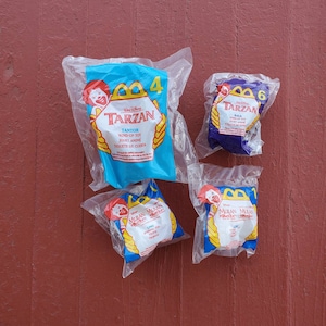 4 McDonalds Happy Meal toys 1999 vintage a in bag new unopened Walt Disney Tarzan large Tantor and small Kala wind up and 2 Mulan Ling spin