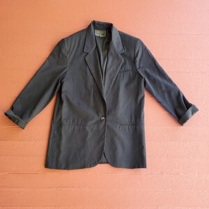 Women&#39;s long black blazer Express Compagnie International 80&#39;s vintage shoulder pads Rayon nylon blend lined acetate over sized size medium