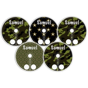 May include: Five round, green and black camouflage fabric patches with the name "Samuel" printed in white on each patch.