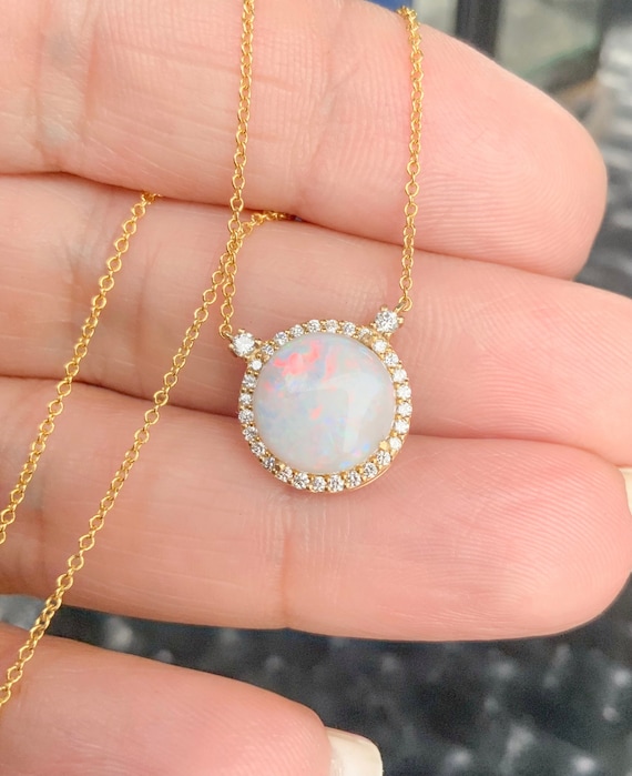 Diamond & opal pendant Diamond & opal pendant